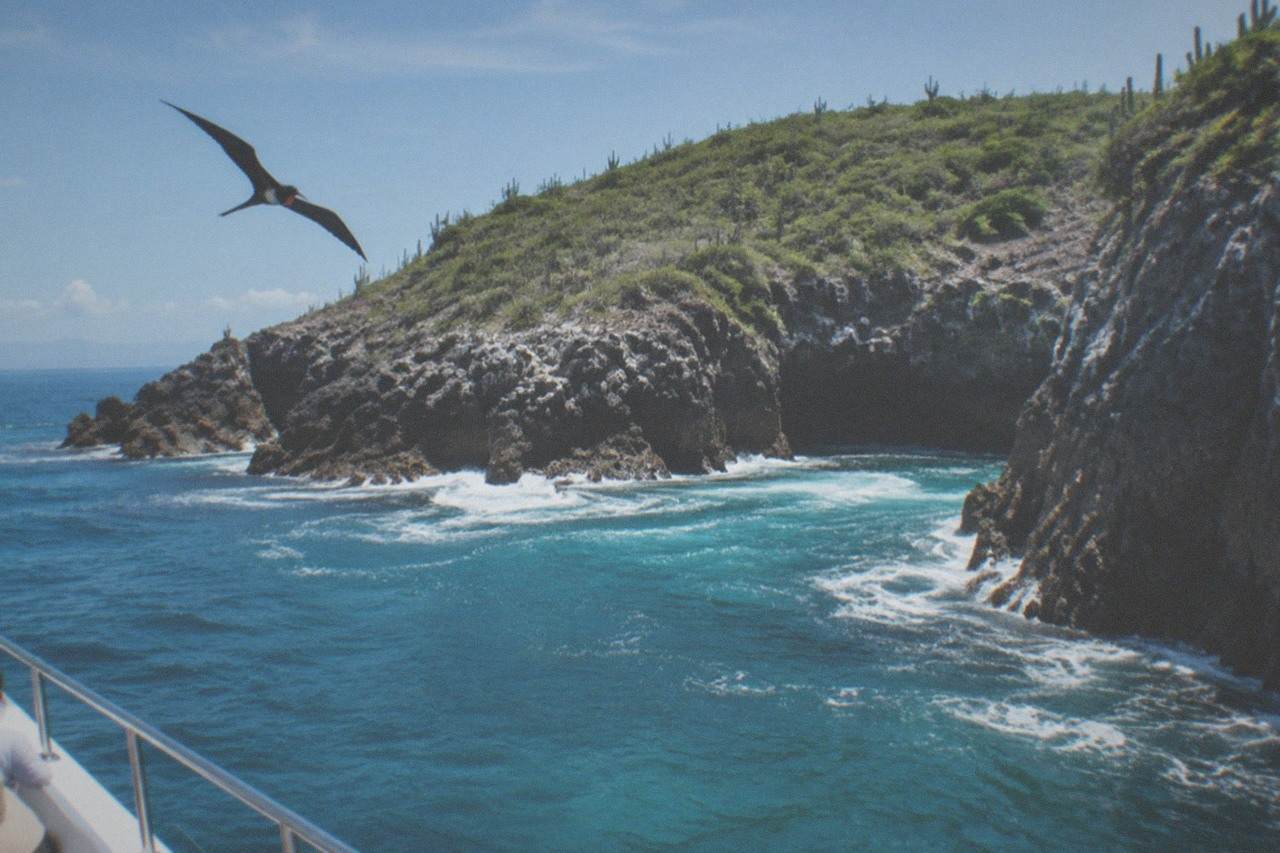 Turquoise water and rocky island cliffs at the Marietas Islands offshore from Puerto Vallarta